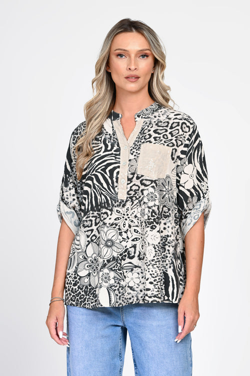 Bluză oversized cu imprimeu animal print și motive florale